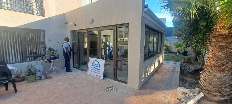 Black aluminium glass doors and windows on an office building